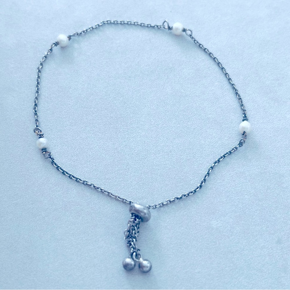 Sterling Silver bracelet with fresh water cultural pearls.